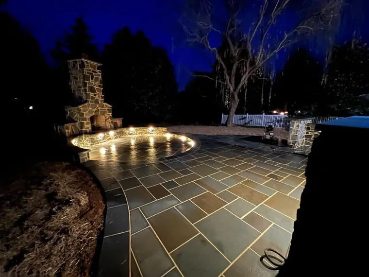 Distant lit fireplace at night